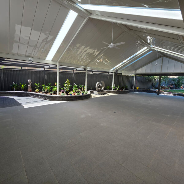 Stoneware 600x300 Ebony Granite | Havenbrick 50mm Charcoal | Dens Landscaping